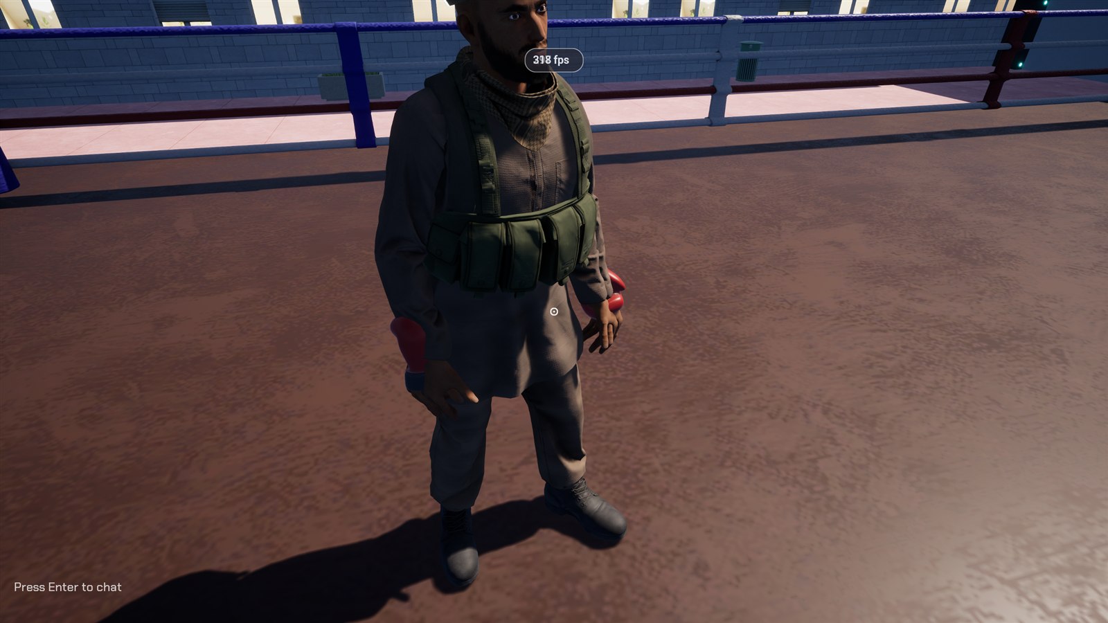 A test player standing in the ring of a Workshop boxing map, added with the spawn bot chat command